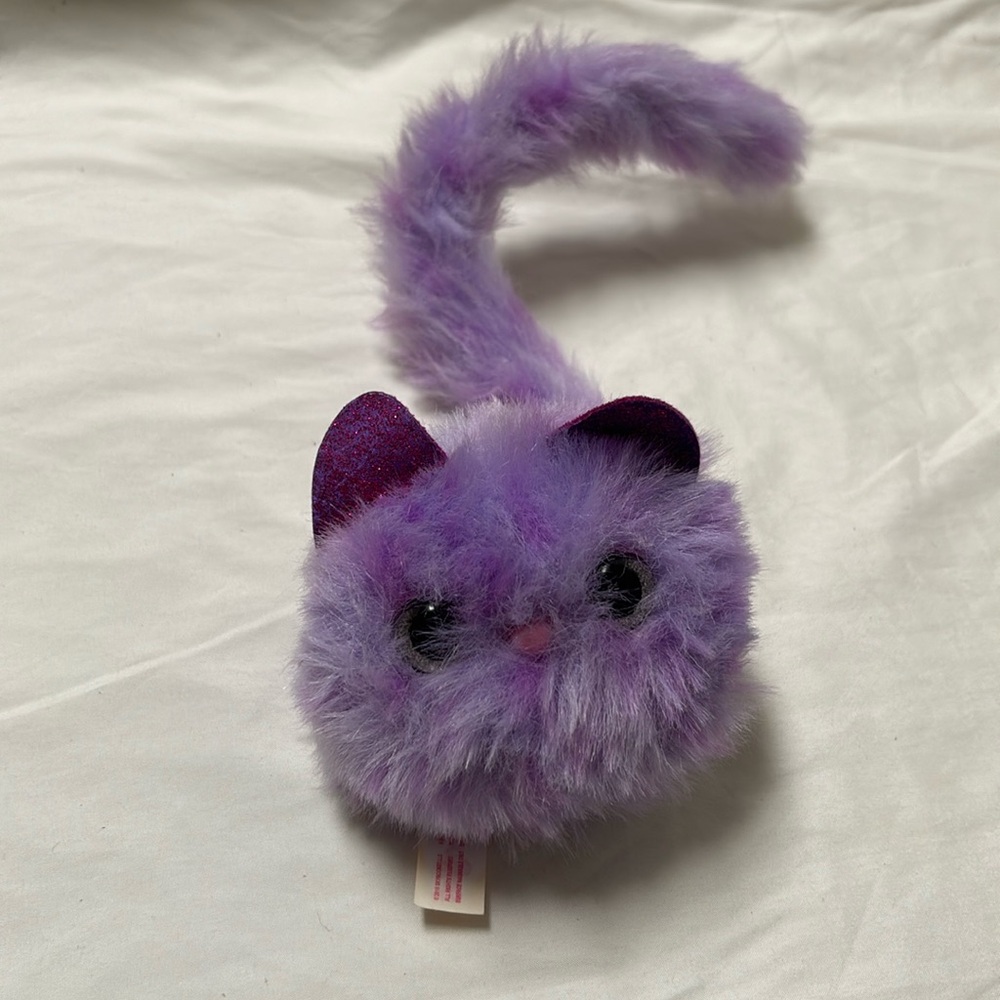 Purple pomsies speckles stuff pet.